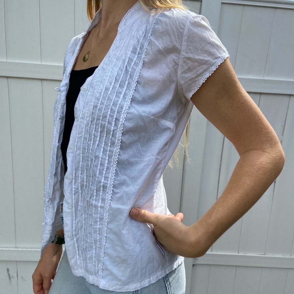 White button up blouse